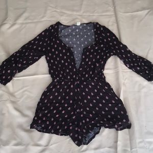 Purple romper with 3/4 sleeves